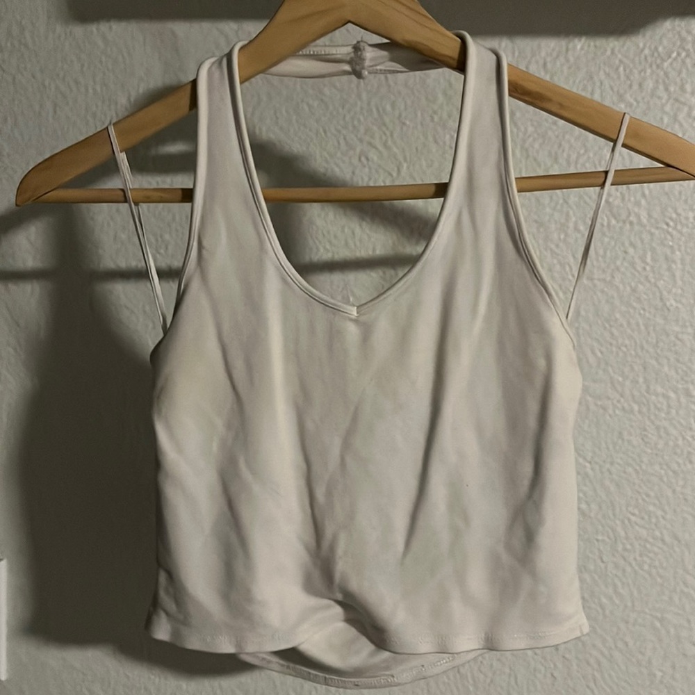 White halter crop top. Lightly worn. Size Small. Garage brand.